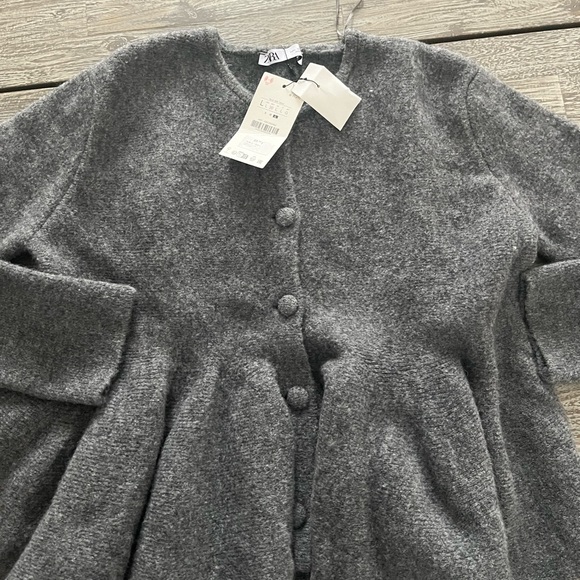 Zara Sweaters - NWT. Zara charcoal grey cardigan with peplum waist. Size L.